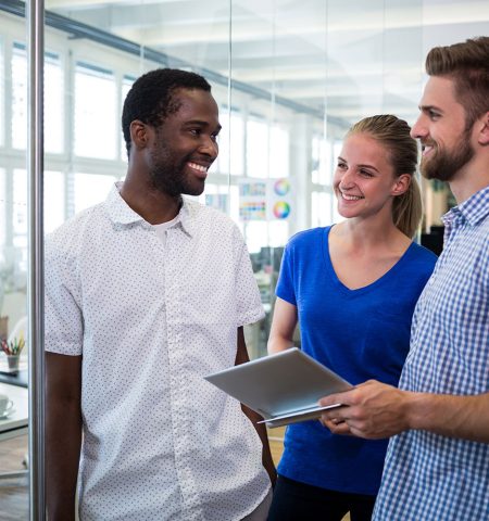 Group of graphic designers interacting with each other